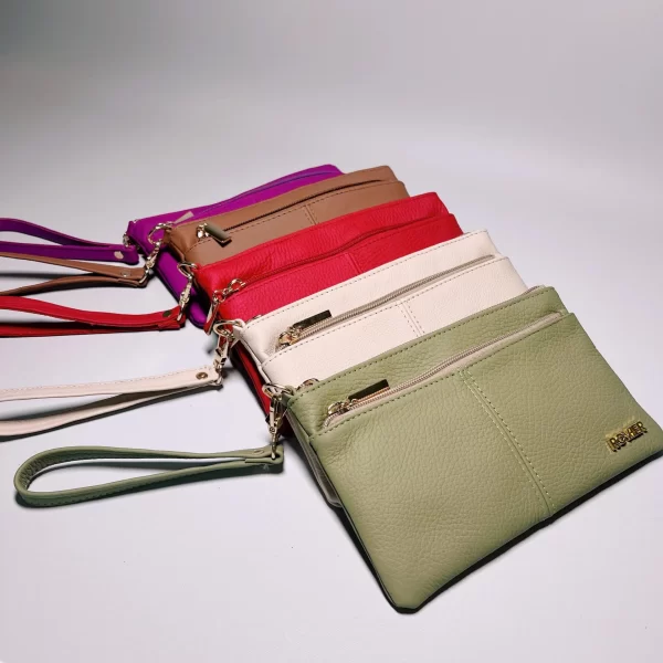 cartera clutch de cuero, clutch wallet de cuero, billetera de cuero, billetera de mujer, neceser de cuero, cartera tipo neceser, clutch compacto de cuero, cartera de mano de cuero, accesorio de cuero para mujer, clutch de cuero boliviano, clutch elegante, clutch exclusivo.