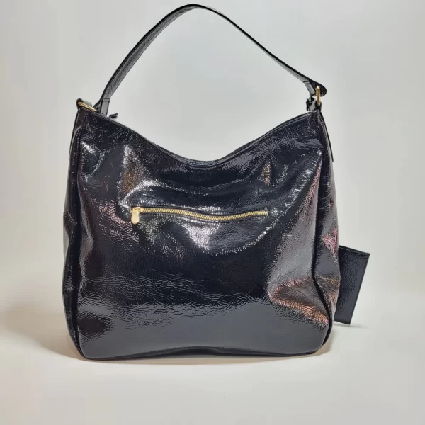 bolsos de cuero, carteras de cuero, accesorios de cuero, cuero vacuno boliviano, bolsos hechos en Bolivia, carteras hechas en Bolivia, moda en cuero, diseño boliviano, bolsos para mujer, carteras para hombre, bolsos elegantes, carteras funcionales, bolsos al hombro, carteras de mano, cuero genuino, artículos de cuero, producción boliviana, calidad duradera, estilo boliviano, regalos corporativos en cuero, bolsos personalizados, carteras con grabado láser, marroquinería boliviana, bolsos de diseño, carteras exclusivas, cuero de alta calidad