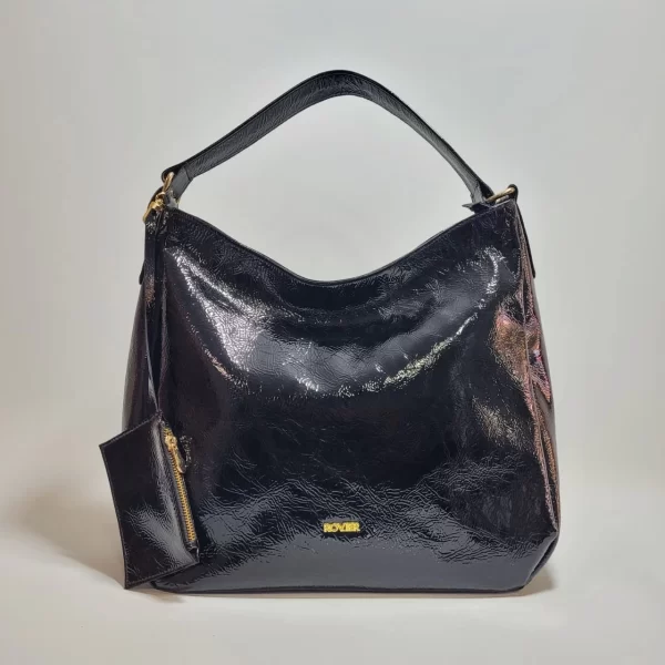 bolsos de cuero, carteras de cuero, accesorios de cuero, cuero vacuno boliviano, bolsos hechos en Bolivia, carteras hechas en Bolivia, moda en cuero, diseño boliviano, bolsos para mujer, carteras para hombre, bolsos elegantes, carteras funcionales, bolsos al hombro, carteras de mano, cuero genuino, artículos de cuero, producción boliviana, calidad duradera, estilo boliviano, regalos corporativos en cuero, bolsos personalizados, carteras con grabado láser, marroquinería boliviana, bolsos de diseño, carteras exclusivas, cuero de alta calidad