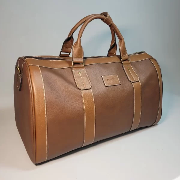 BOLSO DE VIAJE PARA HOMBRE, BOLSO DE CUERO PARA HOMBRE, BOLSÓN DE CUERO, MALETAS, MALETA DE CUERO, MARROQUINERÍA BOLIVIANA, CUERO GENUINO, HECHO A MANO, CUERO BOLIVIANO.