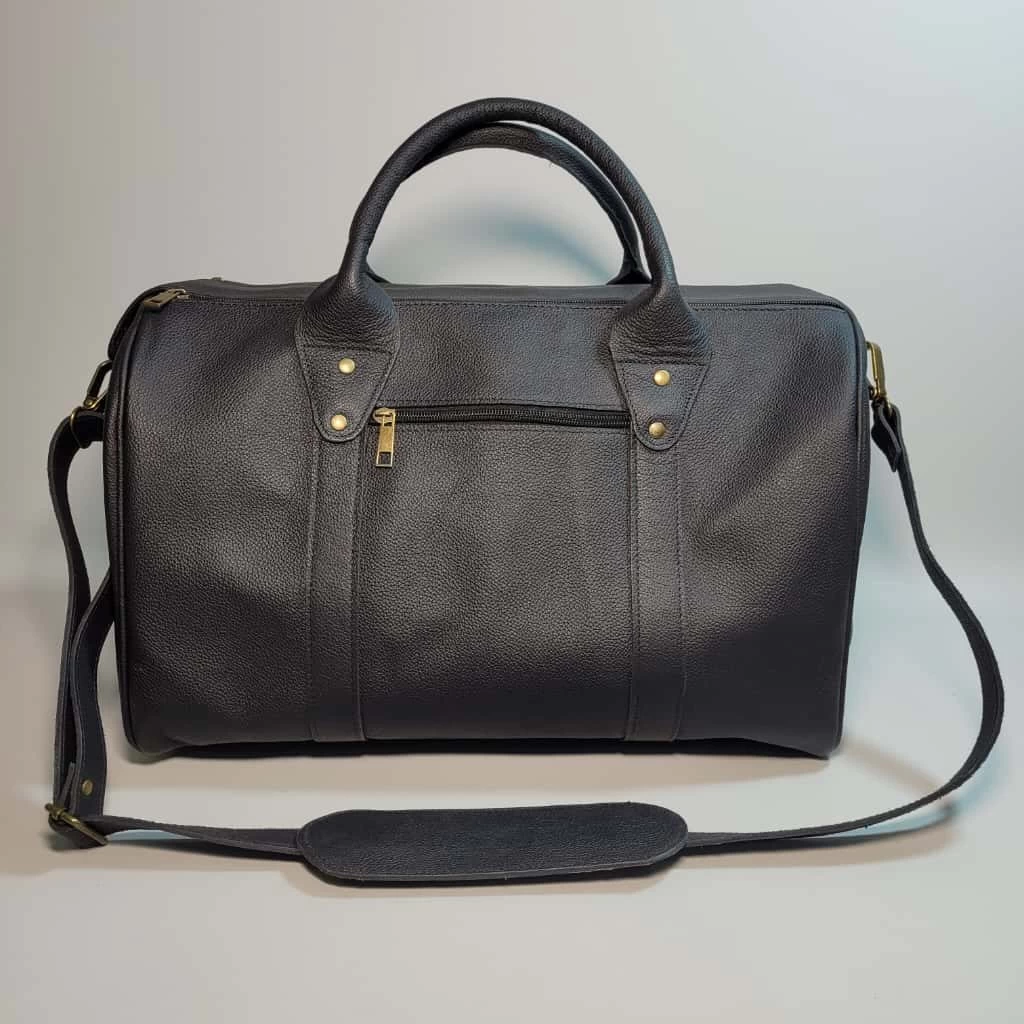 BOLSO DE VIAJE PARA HOMBRE, BOLSO DE CUERO PARA HOMBRE, BOLSÓN DE CUERO, MALETAS, MALETA DE CUERO, MARROQUINERÍA BOLIVIANA, CUERO GENUINO, HECHO A MANO, CUERO BOLIVIANO.